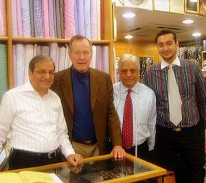 George Bush Senior with Manu, Sham and Roshan in store
