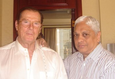 Roger Moore with Manu